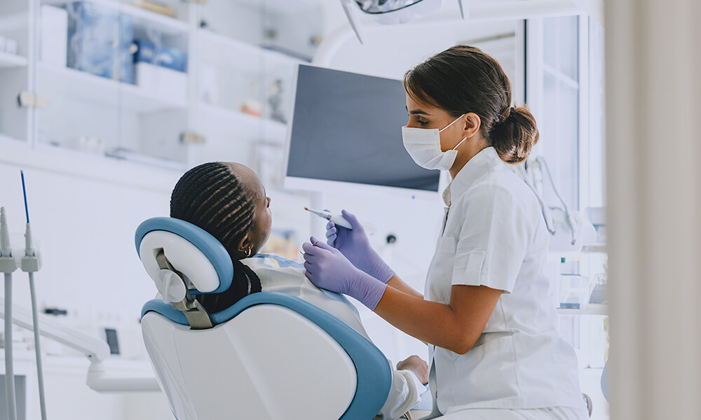 our dentist giving a dental exam in hebron ky