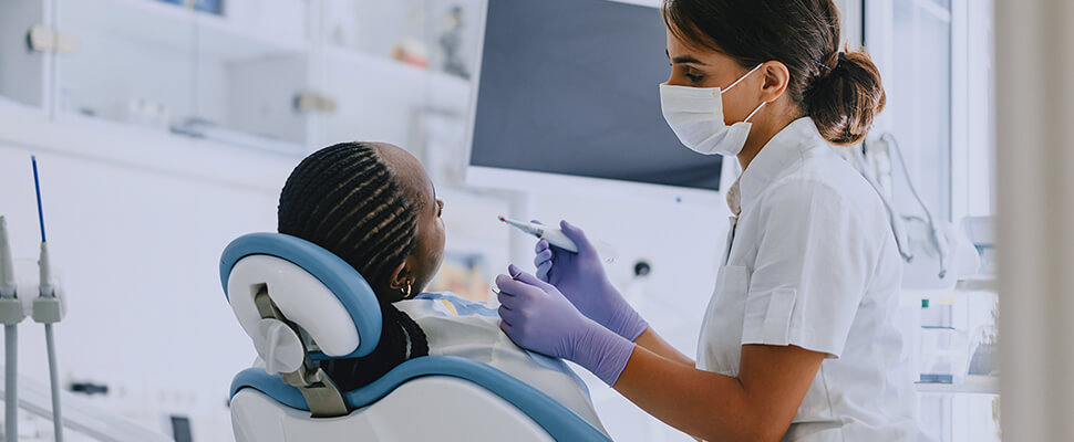 conducting a dental exam in hebron ky